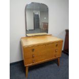 A mid 20th century three drawer dressing table