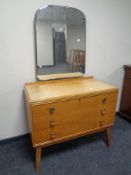 A mid 20th century three drawer dressing table