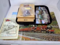 A tray of railway related items - three Atlas Locomotive Legends miniature cabinets and large