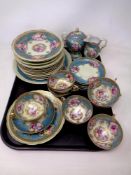 A tray of twenty-nine pieces of continental blue and gilt tea china CONDITION REPORT: