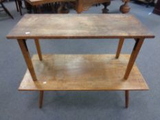 A 20th century teak coffee table together with further coffee table