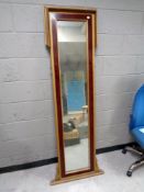 A painted and gilt framed rectangular mirror