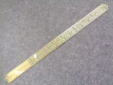 A brass George Harrison liquor licence plaque