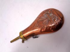 A copper and brass powder flask