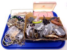 A tray of costume jewellery, bangles, pearl necklaces,