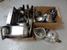 Two boxes of stainless steel kitchen wares : trays, cutlery, kettle,