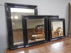 Four contemporary mirrors in ebonised frames