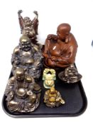 A tray of contemporary Buddha ornaments