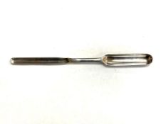 A silver George II marrow scoop,