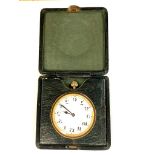 A vintage travel clock in green leather case CONDITION REPORT: Currently does not