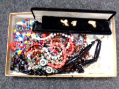 A small collection of costume jewellery, beaded necklaces,