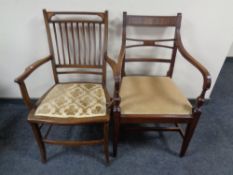 Two carved armchairs
