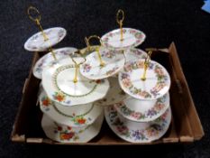 A box of porcelain cake stands