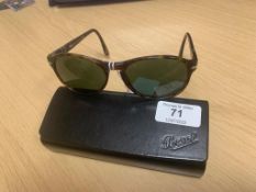 A pair of Persol Model 649 sunglasses, tortoiseshell, in branded black hard carry case.