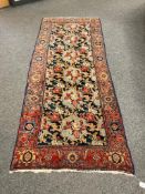 A Persian runner with Abusson central field 94 cm x 234 cm