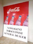 An enamelled tin Coca Cola sign