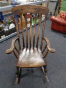 An antique beech rocking chair