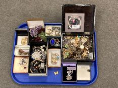 A tray of oriental lacquered jewellery box, costume jewellery, bead necklaces, wristwatch, compact,