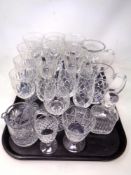 A tray of 20th century cut glass wine glasses, champagne flutes,