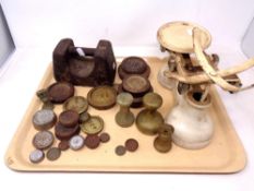 A tray of antique kitchen scales,