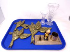 A tray of three graduated brass duck wall hangings,