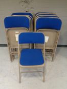 Twelve folding chairs