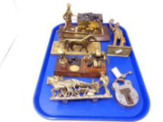 A tray of brass mining ornaments,