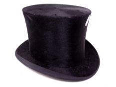 A gentleman's black silk top hat by Leonard's