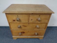 A Victorian pine chest of four drawers