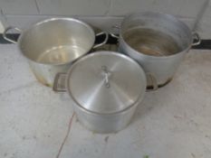 Six stainless steel cooking pots