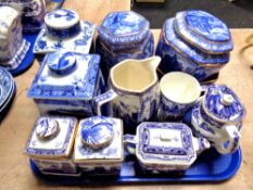 A tray of Ringtons blue and white caddies, jugs,