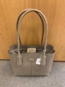 A Tod's leather tote handbag, grey/taupe, with leather emblem and stamped chrome fastener,
