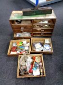 An eight drawer wooden index chest and contents together with a wood working plane