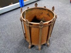 A copper and iron coal bucket