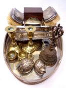 An oval silver plated gallery tray, plated sifers in the form of quails, brass candlesticks,