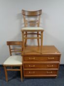 A pair of 20th century dining chairs with cream vinyl seats together with a wood effect chest