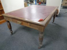A 19th century mahogany library table with a red leather inset panel (missing two drawers)