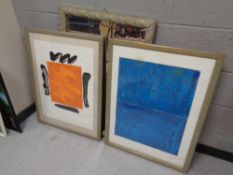 A decorative framed mirror and two framed prints
