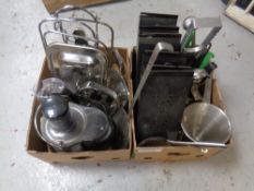 Two boxes of kitchen utensils : trays, sieves,