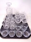 A tray of cut glass decanter, rummers,