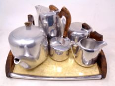 A five piece Picquot ware tea set on matching tray