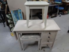 A painted dressing table and two stools