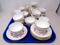 A tray of Minton Laurentian and Duchess winter part china tea sets