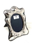 A silver easel photo frame, height 19cm.