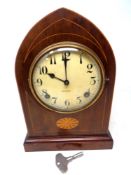 An inlaid mahogany eight day mantel clock signed Gilbert