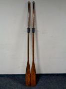 Two wooden oars