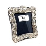 A silver easel photo frame, height 11.5cm.