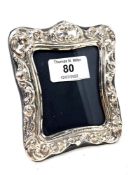 A silver easel photo frame, height 11.5cm.