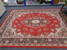 A machine made Persian design carpet,