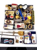A box of Masonic related items including medals, miniature swords,